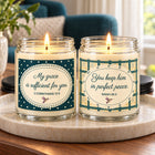 Grace & Peace candle duo lit on a stone tray